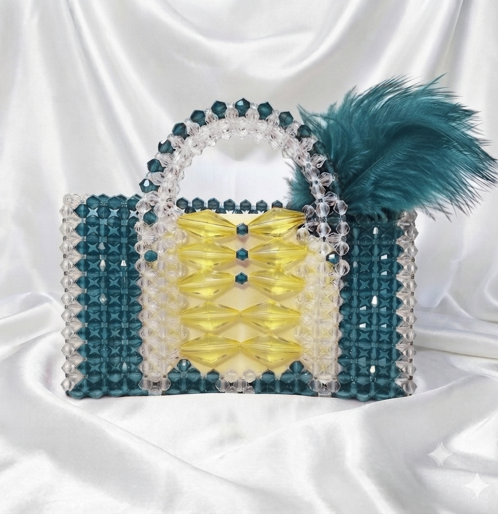 SAC PERLÉ À PLUME – ÉDITION PRESTIGE