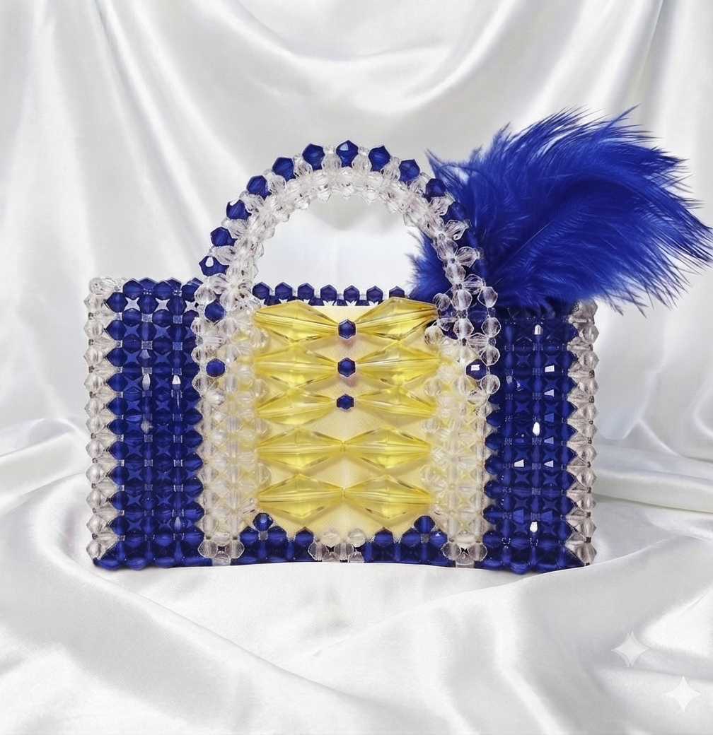 SAC PERLÉ À PLUME – ÉDITION PRESTIGE